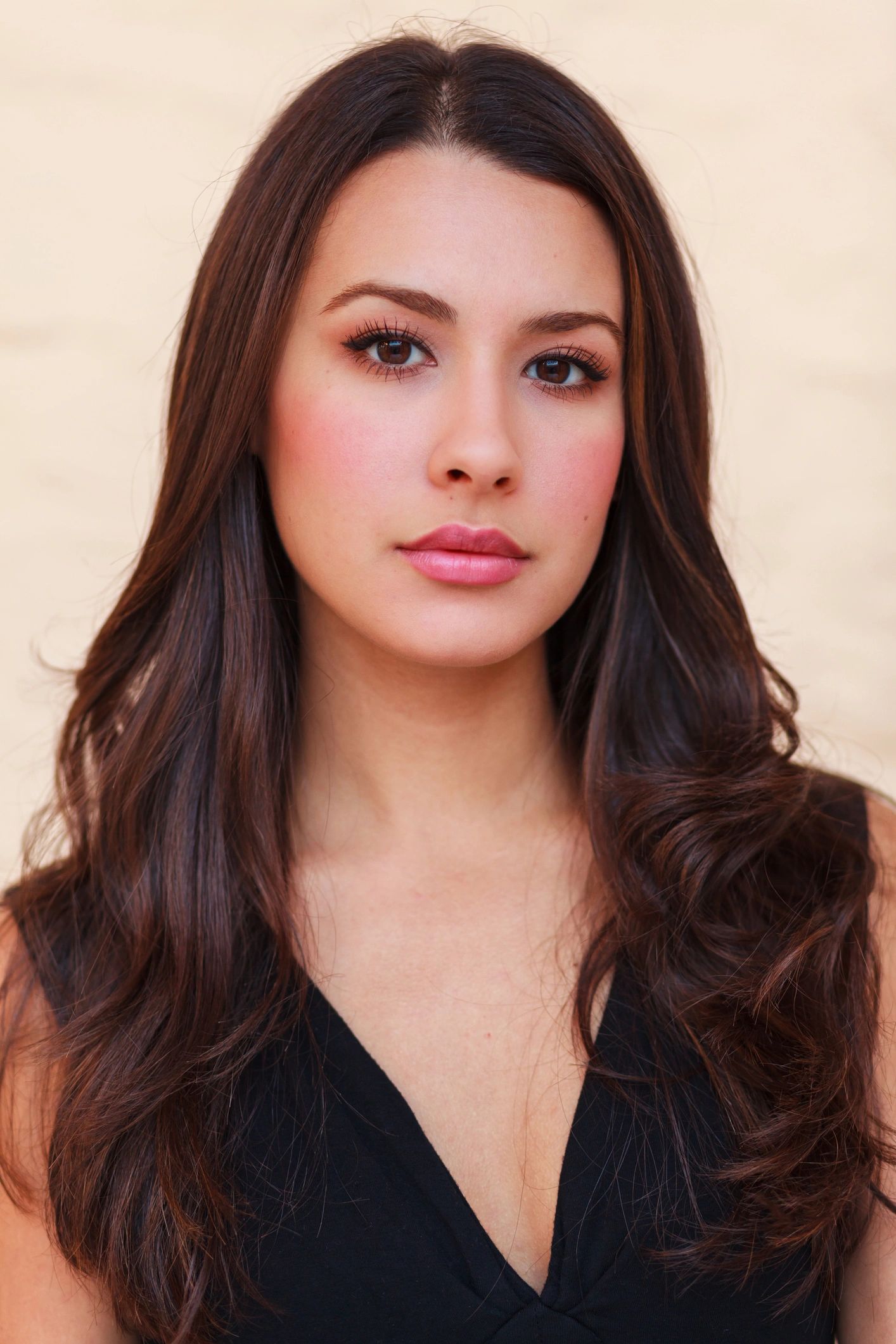 Beautiful woman with radiant complexion and refined makeup