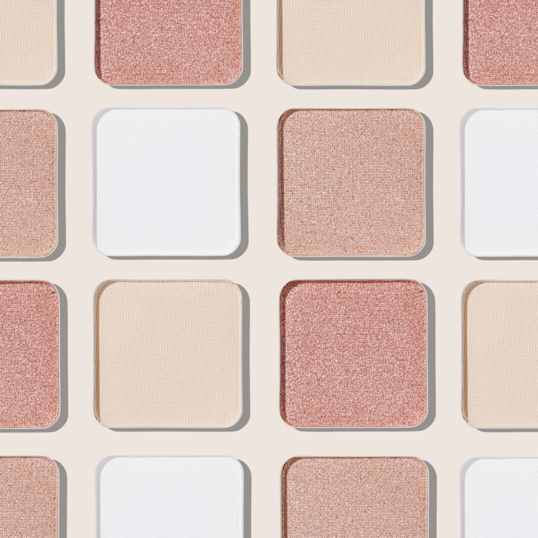 Neutral makeup palette texture flat lay