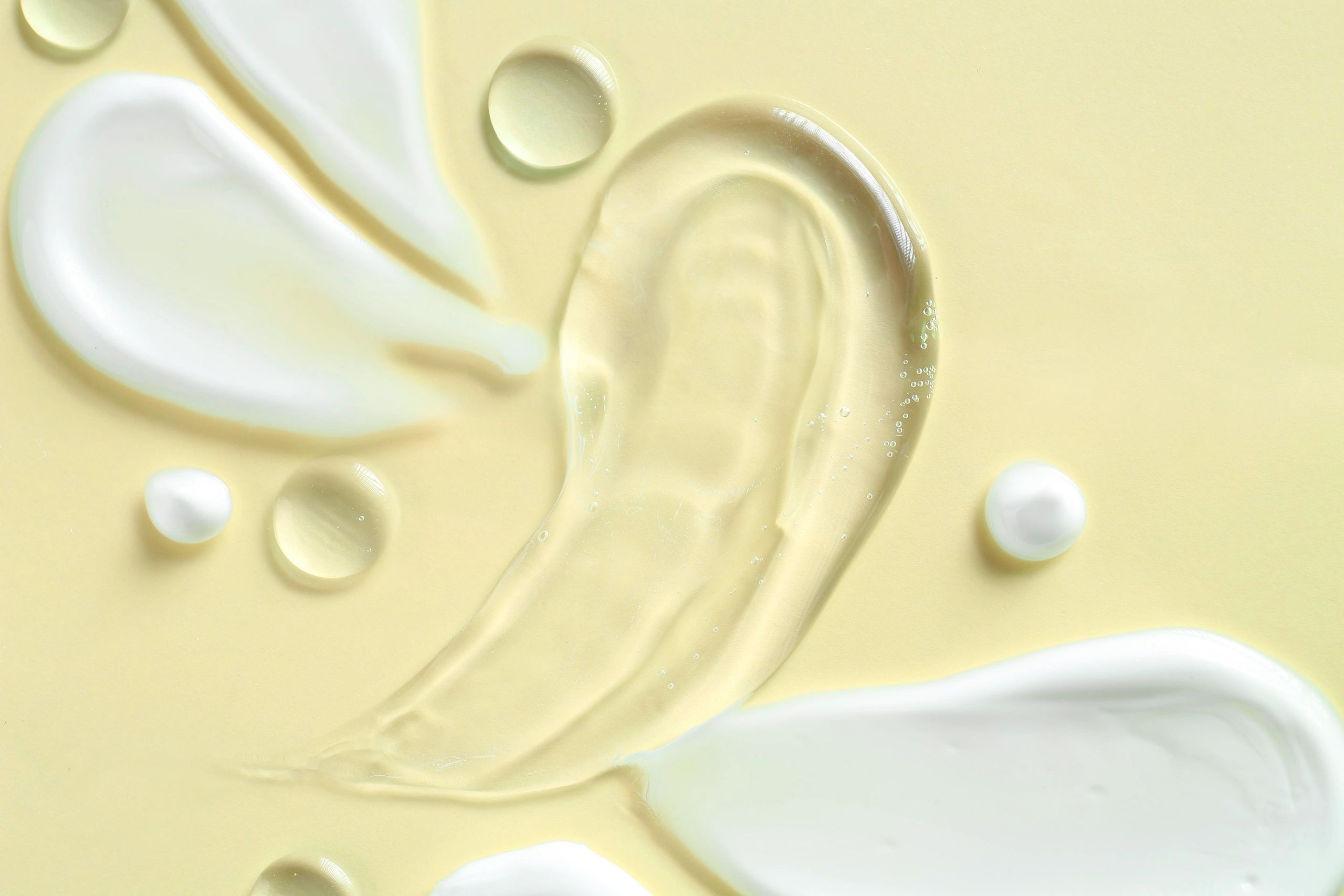 Cosmetic texture smears on beige background