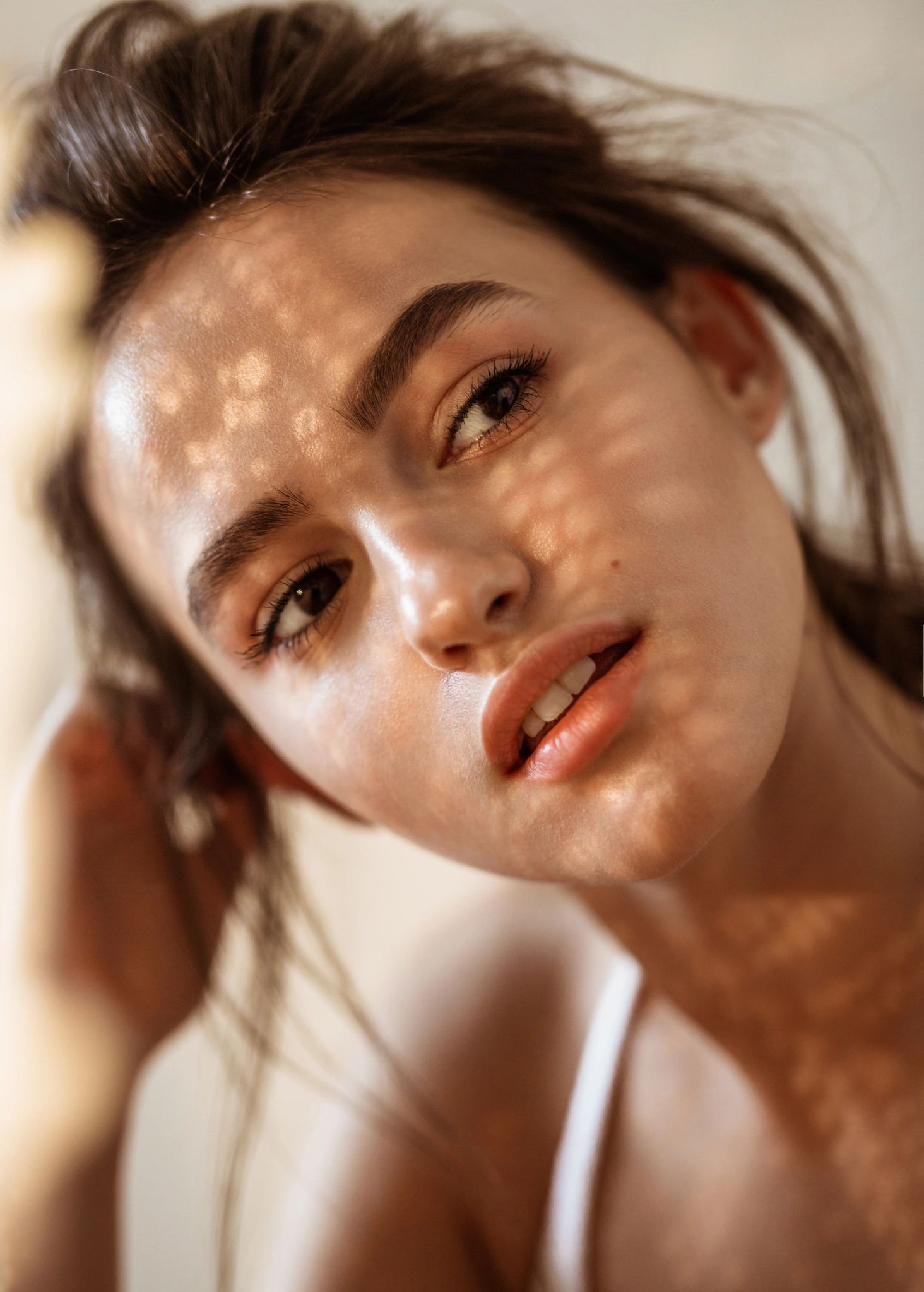 young beautiful woman with shadows on the face